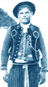 Fig. 6/a: Man in vest decorated with metal buttons, Nógrád county.